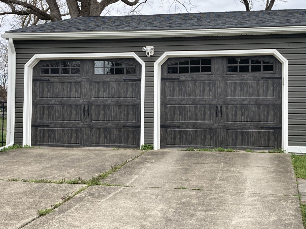 Faux wood carriage garage doors